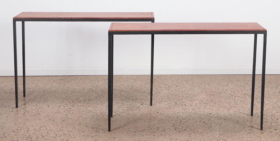 A pair of iron and leather console tables in the manner of Jean-Michel Frank. Ht: 31" Wd: 47.25": A pair of iron and leather console tables in the manner of Jean-Michel Frank. Ht: 31" Wd: 47.25" Dpth: 15"
