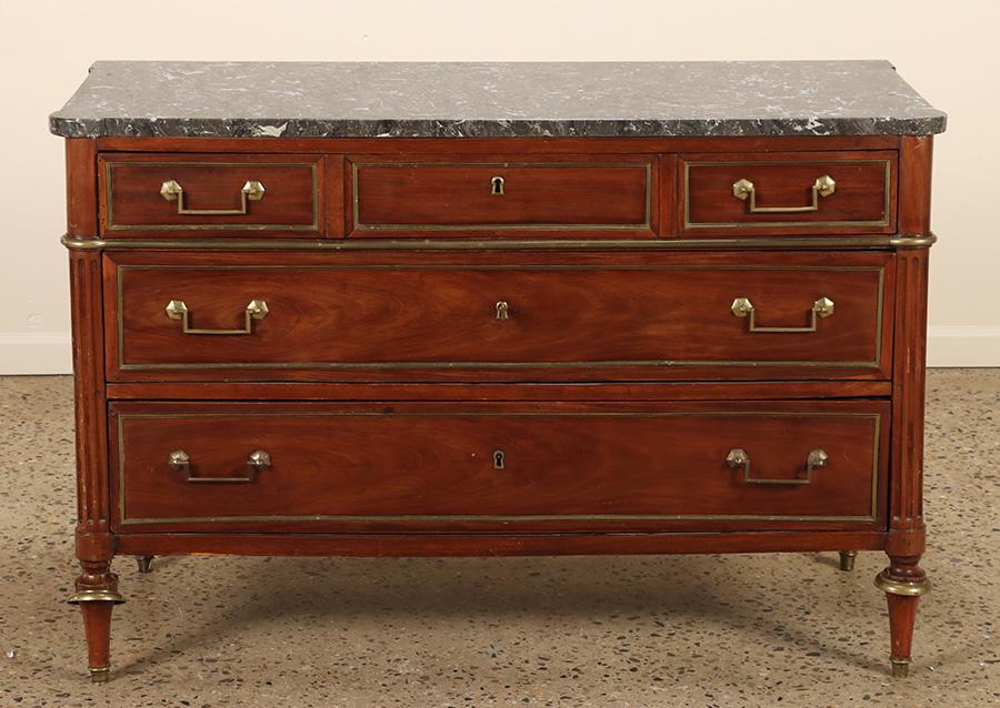 Louis XVI mahogany marble top commode having bronze trim thru-out C 1800. Ht: 33.5" Wd: 50.5" Dpth:: Louis XVI mahogany marble top commode having bronze trim thru-out C 1800. Ht: 33.5" Wd: 50.5" Dpth: 23"