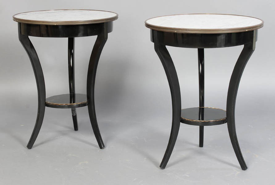 PR REGENCY STYLE EBONIZED GUERIDONS C.1940: Pair of Regency style ebonized gueridons each with bronze framed marble top over sabre legs circa 1940. Ht: 24.75" Width: 19.5"