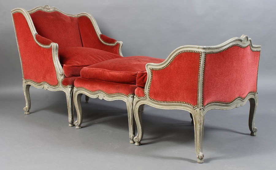 LOUIS XV STYLE 3 PC ANTIQUE CHAIR OTTOMAN SET: Louis XV style carved and painted three piece duchesse having a winged seat, ottoman and winged foot rest circa 1900. All upholstered in red velvet. Ht: 37.5" Width: 30" Depth: 76"