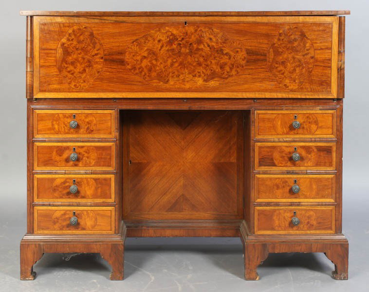 ANTIQUE ENGLISH EDWARDIAN CABINET DESK: English Edwardian cabinet desk having inlaid burled walnut decorated top over a tall front with fully fitted interior circa 1880. With two sets of four banded drawers, the whole raised on bracket feet