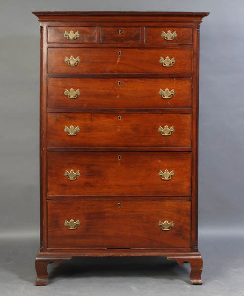 ANTIQUE AMERCAN CHIPPENDALE HIGH CHEST WALNUT: American Chippendale walnut high chest having stepped cornice and three over five graduated drawers flanked by fluted quarter columns. Raised on ogee bracket feet. Ht: 83" Width: 39" Depth: 21"