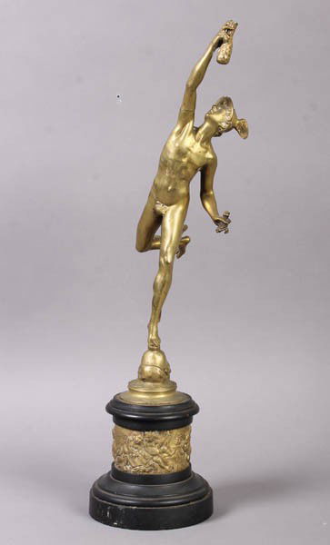 ANTIQUE STATUE MERCURY C.1900: Bronze statue of Mercury on a slate plinth with putti frieze circa 1900. Ht: 18" Width: 4" Depth: 6"