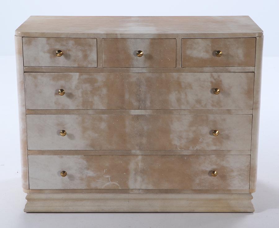 FRENCH ART DECO STYLE PARCHMENT COVERED CHEST OF DRAWERS C 1940 IN THE MANNER OF SAMUEL MARX.: French Art Deco style parchment covered chest of drawers C 1940 in the manner of Samuel Marx. Ht: 33.75" Wd: 44" Dpth: 21"