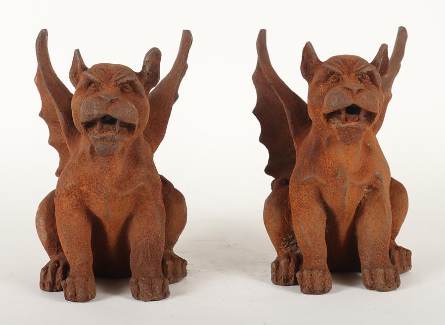 A PAIR OF MENACING CAST IRON GARGOYLES. (1 of 8)
