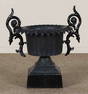 CAST IRON GARDEN URN WITH HANDLES ON BASE C1910.