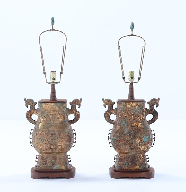 A PAIR OF ASIAN INSPIRED  METAL TABLE LAMPS HAVING A DISTRESSED POLYCHROME FINISH. (1 of 10)
