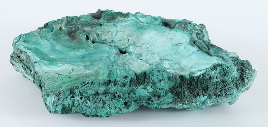 A LARGE SPECIMEN MALACHITE STONE. (1 of 5)