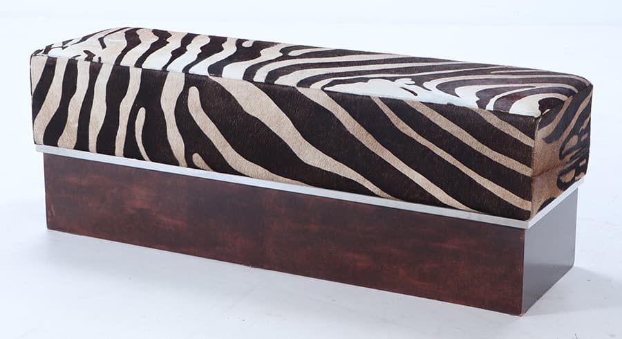 A LARGE ZEBRA PRINTED COWHIDE BENCH RAISED ON BURL WOOD PLATFORM BASE. (1 of 5)