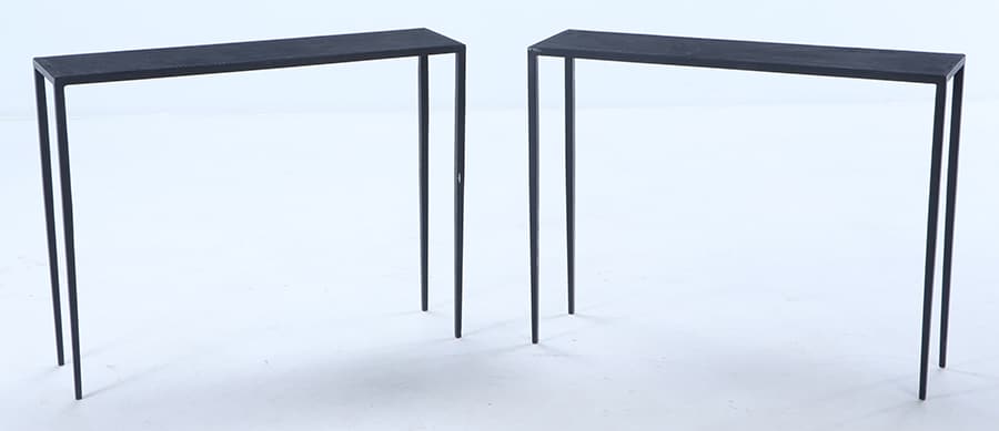 PAIR OF PAINTED IRON AND BLACK HAND STITCHED LEATHER CONSOLE TABLES IN THE MANNER OF FRANK: Pair of painted iron and black hand stitched leather console tables in the manner of Jean-Michel Frank. Ht: 30" Wd: 39.75" Dpth: 10.5"