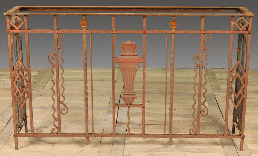 ANTIQUE GARDEN CAST IRON TORCH TABLE BASE: Art Deco cast iron console base with torch center circa 1920. Ht: 33" Width: 56" Depth: 12"