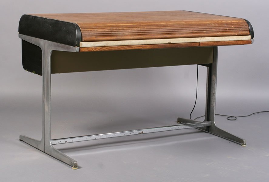 HERMAN MILLER TAMBOUR ROLL TOP DESK: A Herman Miller tambour roll top desk with fitted interior supported on metal splayed leg base circa 1970. Ht: 33" Width: 49" Depth: 32"