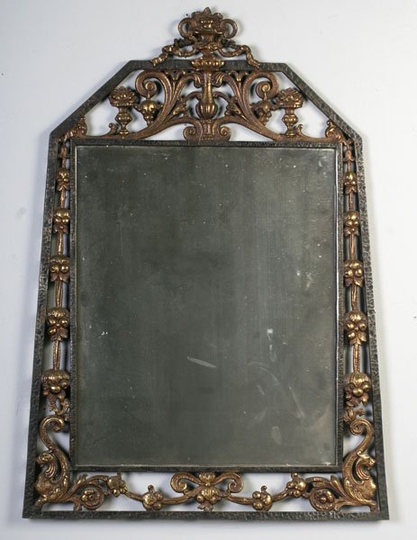 SIGNED OSCAR BACH BRONZE MIRROR C.1930: A signed Oscar Bach two-tone bronze mirror having pierced scroll work with classical figural embellishments and canted sides circa 1930. Ht: 33" Width: 24"