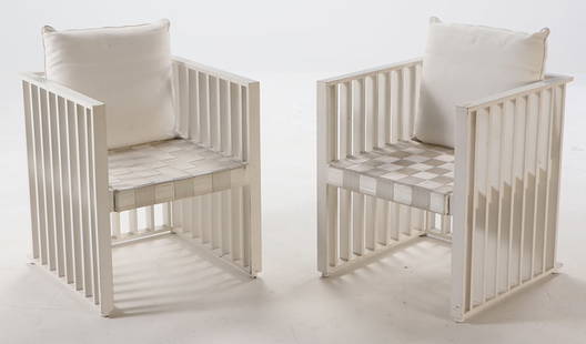 PAIR PAINTED CUBE FORM "PURKERSDORF" ARM CHAIRS DESIGNED IN 1903 BY JOSEF HOFFMANN. THIS PAIR IS A: Pair painted cube form "Purkersdorf" arm chairs designed in 1903 by Josef Hoffmann. This pair is a modern version labeled Whitman. Ht: 27.5" Wd: 24" Dpth: 24" Seat: 16.5"