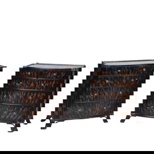 A PAIR OF MAITLAND SMITH EBONIZED FIVE DRAWER BOW FRONT COMMODES HAVING EXOTIC FLAME PAINTED DECOR: A pair of Maitland Smith ebonized five drawer bow front commodes having exotic flame painted decoration and leather wrapped trim. Each drawer is adorned with lion faced drawer pulls. Ht: 35.25" Wd: 35