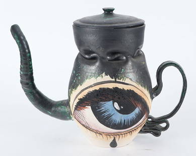 MICHAEL LUCERO (AMERICAN B. 1953) POST MODERNIST CERAMIC SCULPTURE IN THE FORM OF A COFFEE POT: Michael Lucero (American, b.1953) Post Modernist Ceramic sculpture in the form of a coffee pot. Having green glaze and hand painted eye. From the New World Series Ht: 10" Wd: 12.5" Dpth: 6"