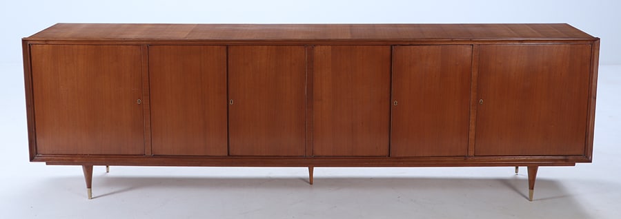 A LARGE MID CENTURY MODERN SIX DOOR MAHOGANY SIDEBOARD HAVING BRASS TRIMMED FEET. (1 of 8)