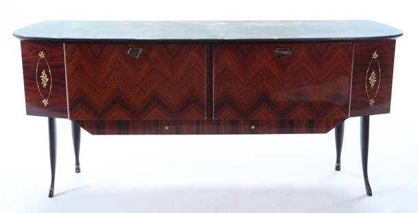 ITALIAN ROSEWOOD SIDEBOARD WITH REVERSE PAINTED FAUX MARBLE GLASS TOP, TWO DOORS AND A SINGLE: Italian rosewood sideboard with reverse painted faux marble glass top, two doors and a single drawer C 1955. Ht: 33.5" Wd: 75" Dpth: 18"