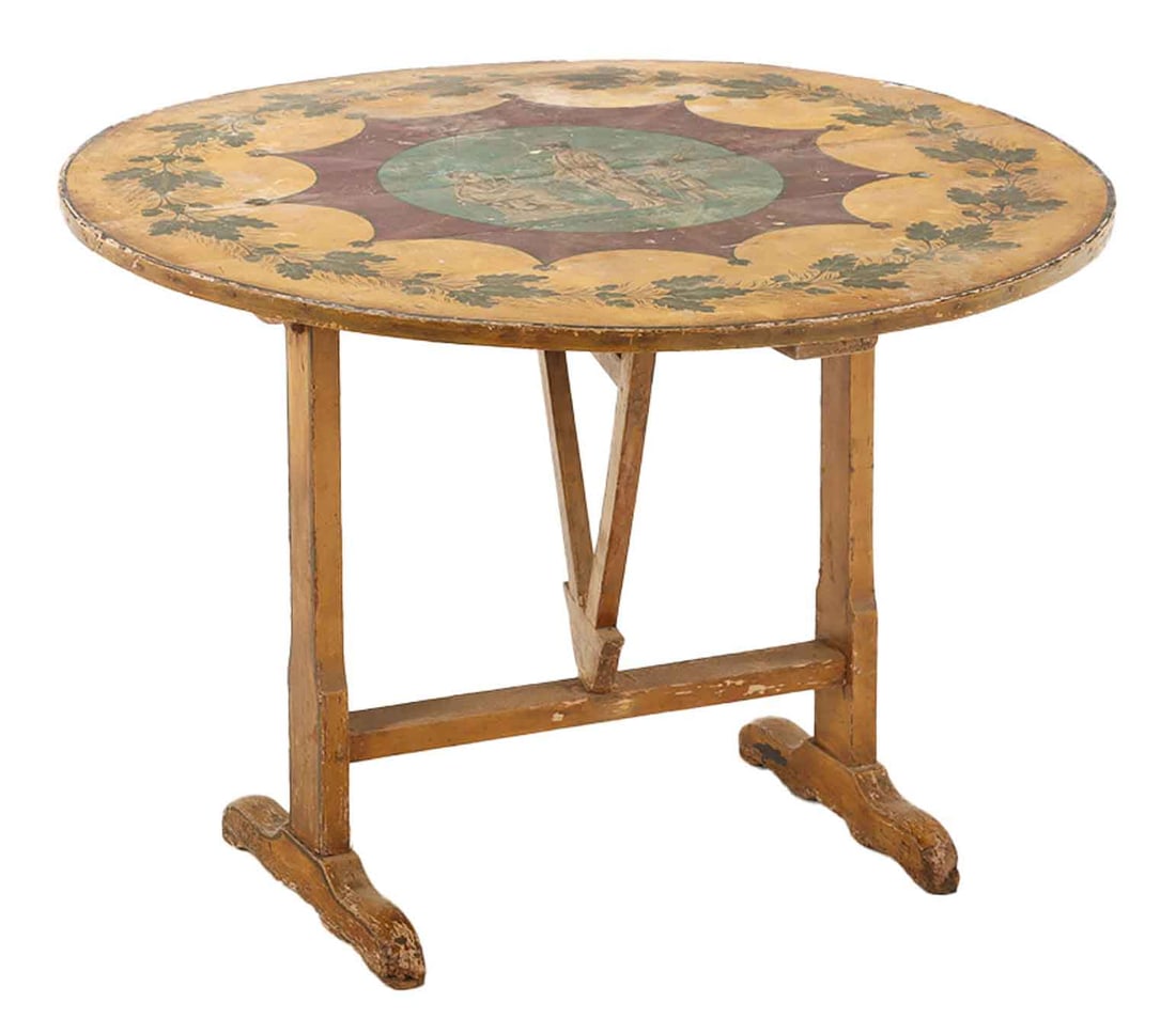 PAINT DECORATED NINTEENTH CENTURY FRENCH TILT TOP WINE TASTING TABLE.: Paint decorated Ninteenth century French tilt top wine tasting table. Ht:28 Wd:39.25 Dpth:39.25 Dia: SeatHt: