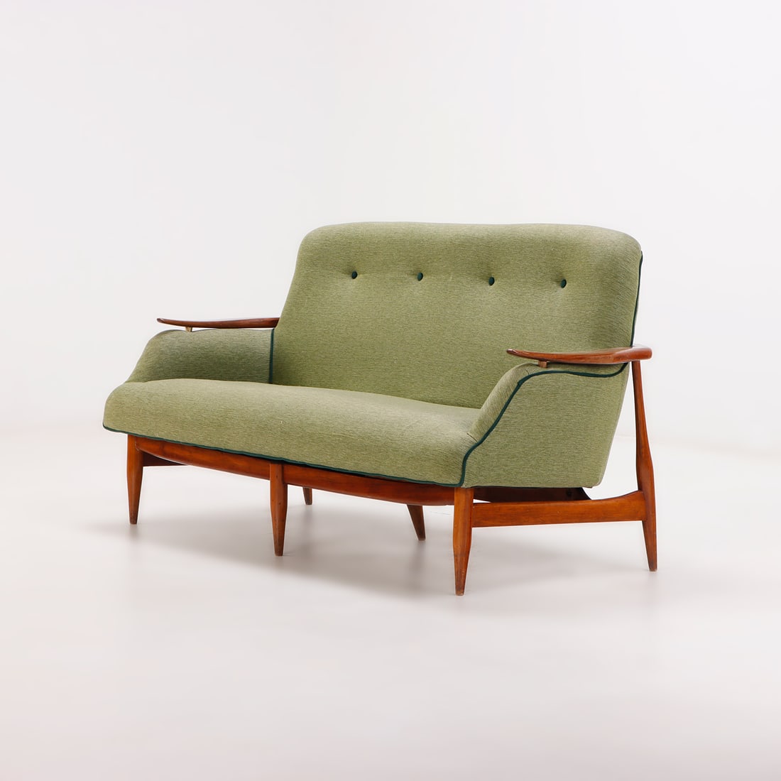RESTORED SOFA IN THE MANNER OF FINN JUHL HAVING FLOATING ARMS WITH BRASS BUTTONS C 1950. (1 of 6)