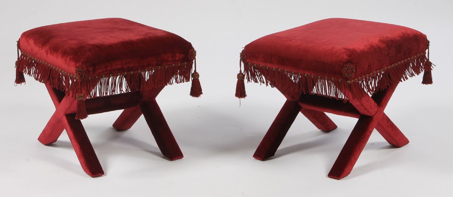 PR UPHOLSTERED X FORM STOOLS WITH FRINGES: Pair of upholstered X-form stools decorated with fringe trim and tassels. Ht: 18" Width: 23" Depth: 17.5"