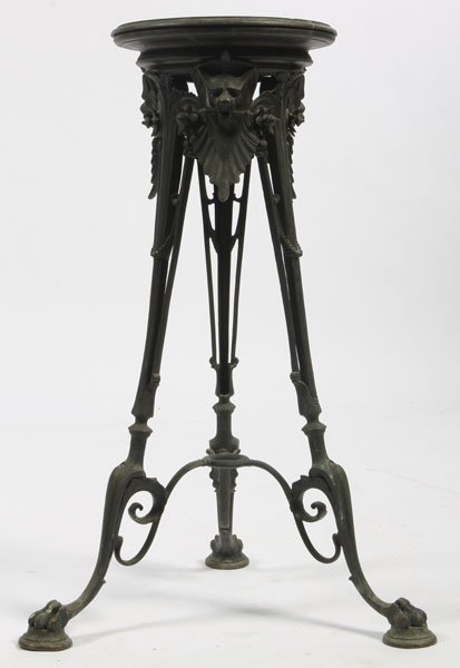 ANTIQUE BRONZE GRAND TOUR PEDESTAL C.1890: Bronze Grand Tour pedestal having revolving top over stylized griffin heads and downswept legs with paw feet and stretcher circa 1890. Ht: 34" Width: 21" Depth: 21"