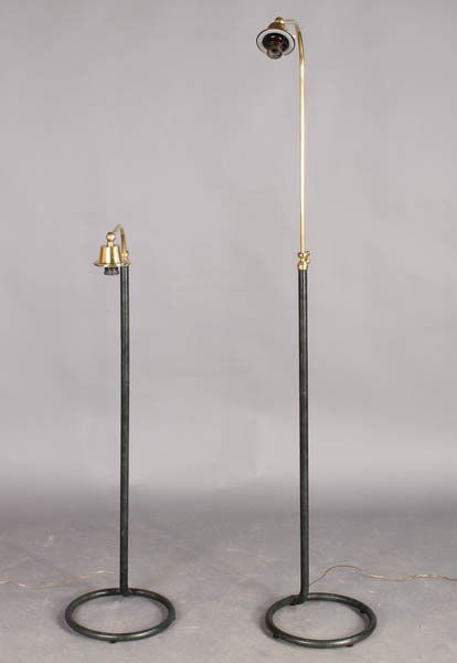 PAIR JAQQUES ADNET STYLE STANDING LAMPS LEATHER: A pair of Jacques Adnet style standing lamps having extending necks and leather clad posts. Ht: 57"