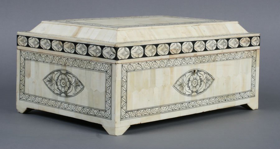 BONE INLAID PENWORK PARQUETRY LIDDED BOX: A bone inlaid and penwork lidded box having a parquetry top with decorated borders over stylized floral decoration. Ht: 6" Width: 13" Depth: 9"