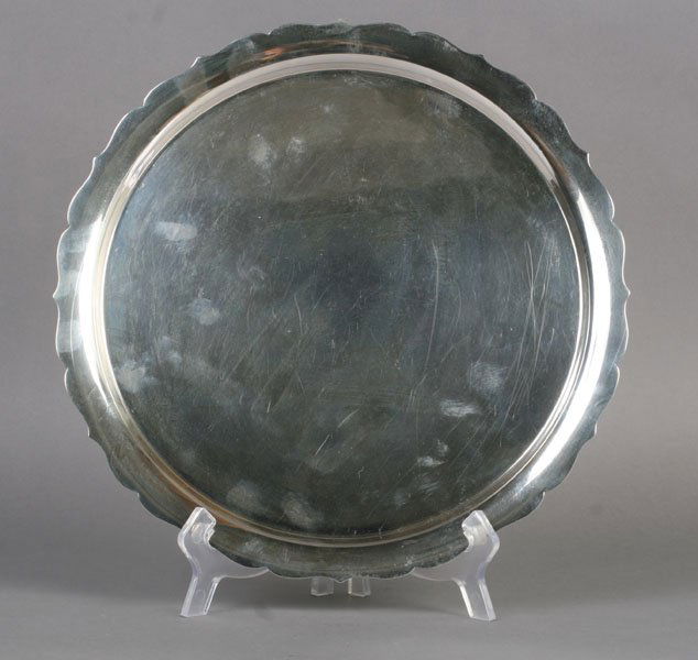 CHIPPENDALE STYLE STERLING SERVING TRAY NO.92: Chippendale style American sterling silver tray no. 92. 20.47 troy ounces. Dia: 12.25"