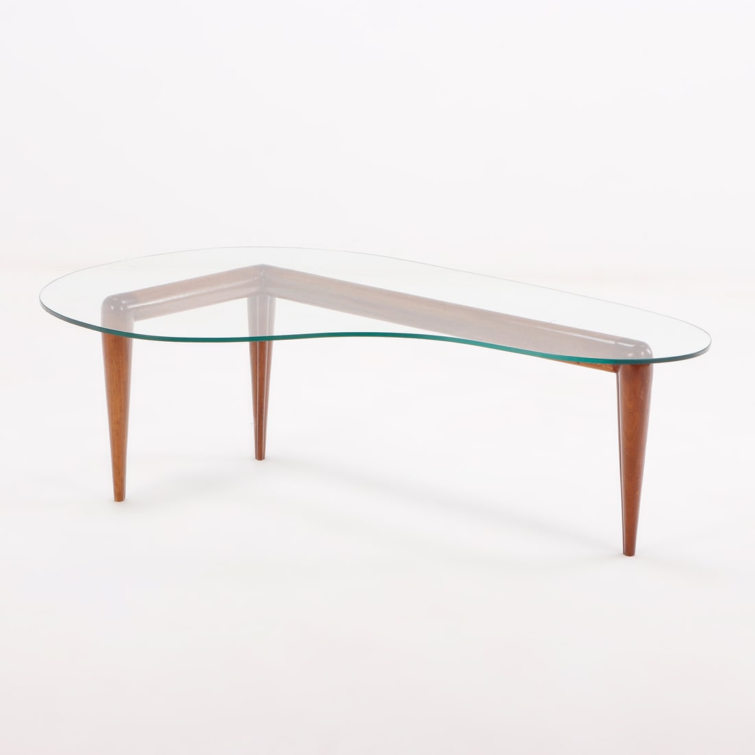 GLASS TOP WALNUT COFFEE TABLE IN THE MANNER OF ROBBSJOHN GIBBINGS. (1 of 5)