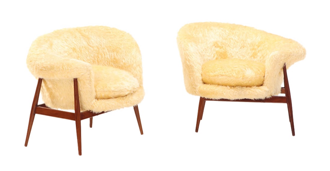 UNUSUAL PAIR OF ASYMMETRIC MAHOGANY LOUNGE CHAIRS DONE IN A TINTED FAUX GOAT SKIN.: Unusual pair of asymmetric mahogany lounge chairs done in a tinted faux goat skin. Ht: 31" Wd: 39" Dpth: 31" Seat: 19"