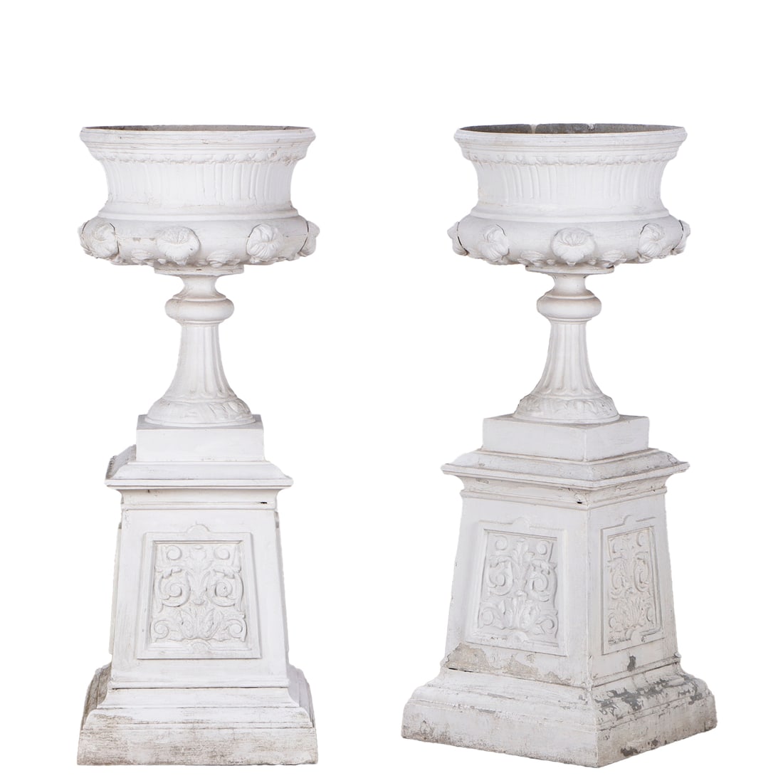 PAIR CAST ALUMINUM "TULIP" URNS ON SEPARATE DECORATED BASES. (1 of 8)