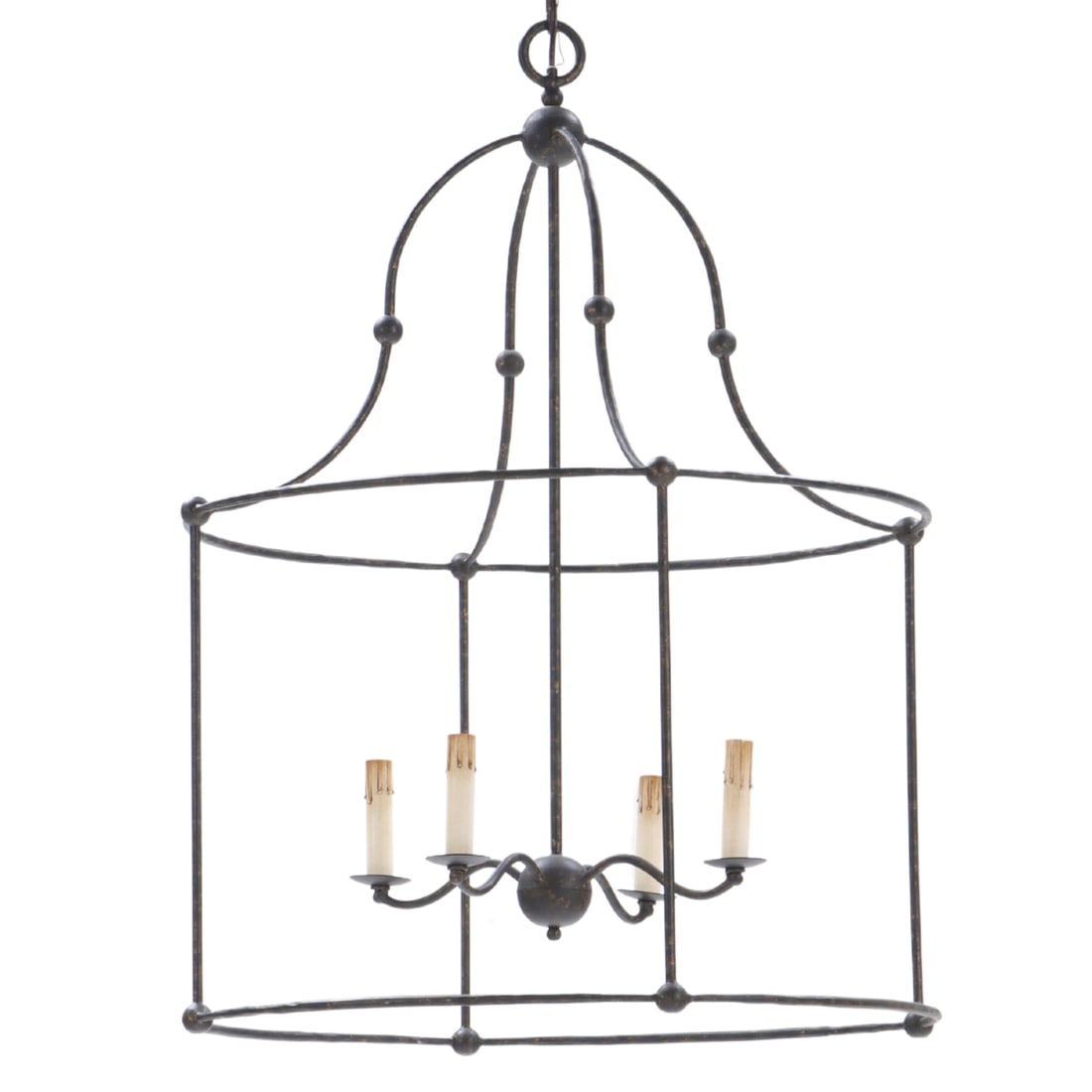 A CYLINDER FORM IRON LANTERN: A cylinder form iron lantern. Ht: 33.25" Wd: 25" Dpth: 25"