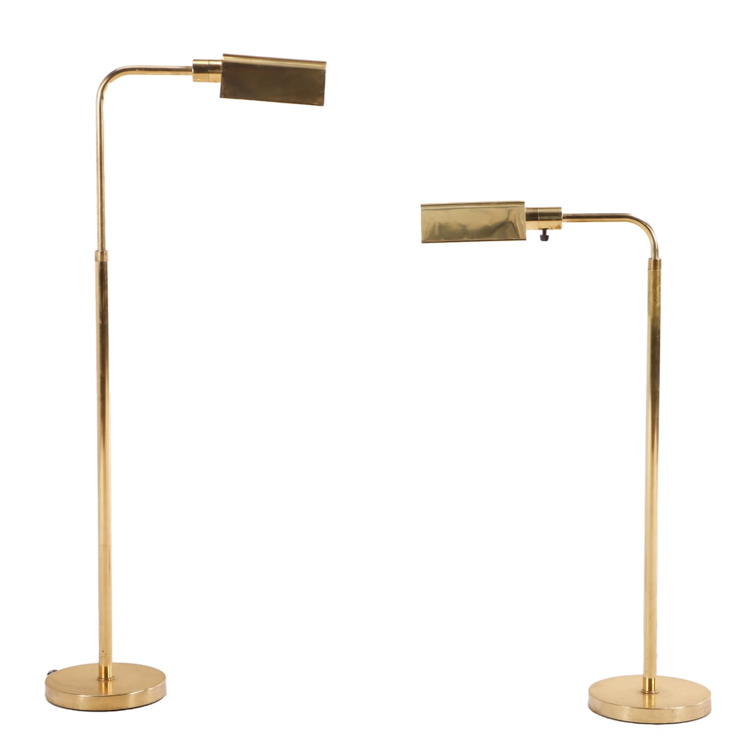 A NEAT PAIR OF ADJUSTABLE BRASS FLOOR LAMPS IN THE MANNER OF CEDRIC HARTMAN C 1970. (1 of 6)