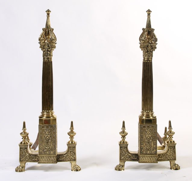 LARGE BRONZE NEOCLASSICAL FIREPLACE ANDIRONS: Large and impressive bronze Neoclassical andirons circa 1900, with corinthian capitals and claw footed bases. Kamelot Auction House is selling this lot without reserve by order of the United States Ba