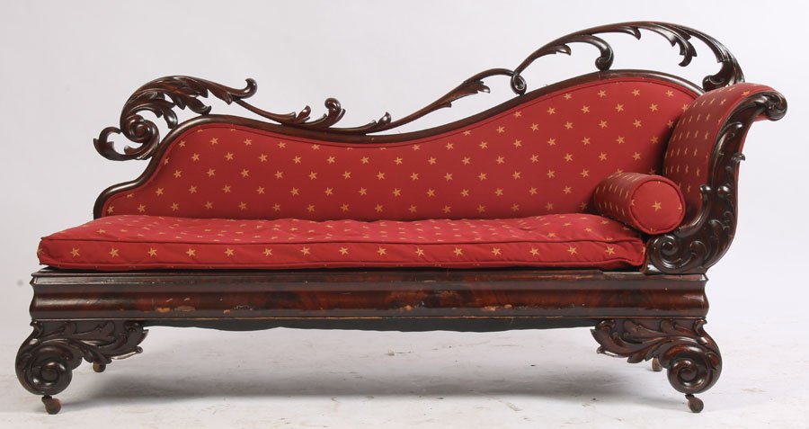 ANTIQUE MAHOGANY EMPIRE RECAMIER CHAISE LOUNGE: Nineteenth century mahogany Empire recamier with open scroll work and loose cushion seat. Ht: 38" Width: 70" Depth: 24"
