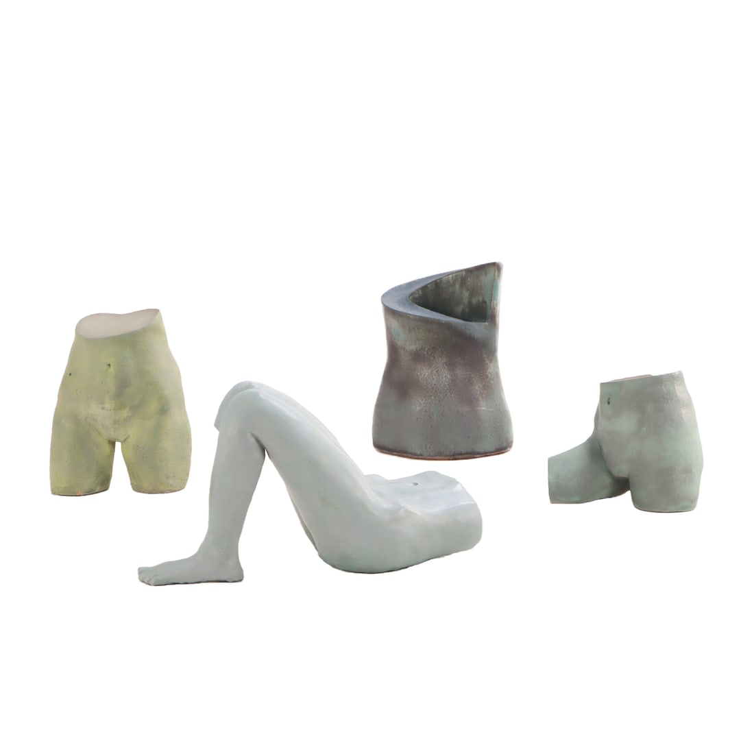 A COLLECTION OF FOUR LARGE GLAZED EARTHENWARE TORSOS (1 of 9)