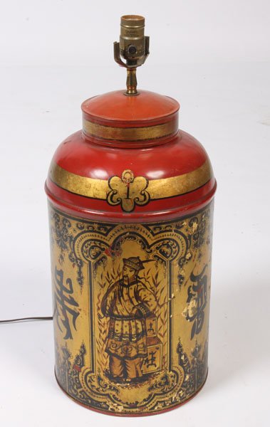 PAINTED GILT TOLE TEA CANISTER LAMP: A painted and gilt decorated tole tea canister lamp circa 1890. Ht: 22" Dia: 10"