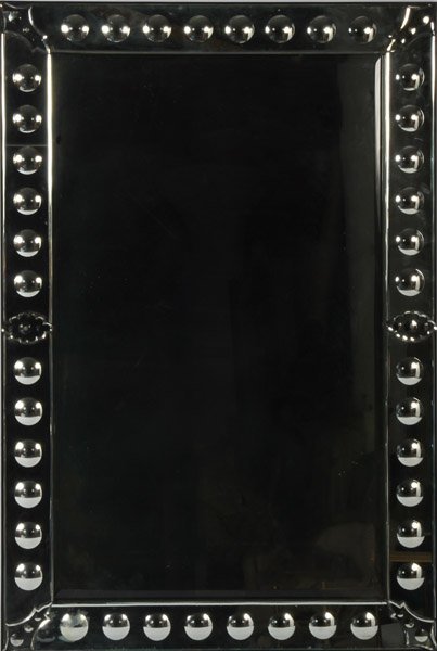 A rectangular form Hollywood Regency mirror: A rectangular form Hollywood Regency mirror with convex details on border. Dimensions: Ht: 47.5" Width: 31.5"