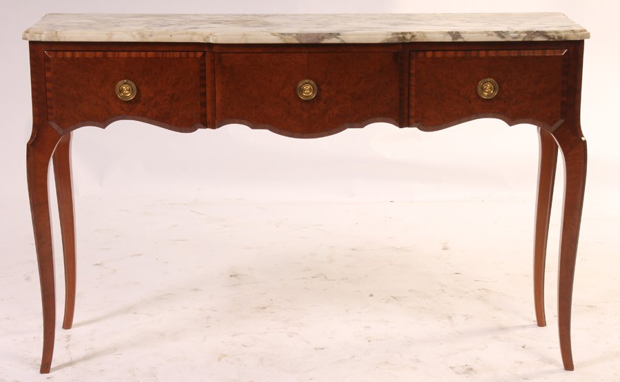 MARBLE TOP CONSOLE TABLE FRENCH 3 DRAWERS: A marble top console table in the French taste having a shaped marble top over three drawers supported on cabriole legs circa 1940. Ht: 31" Width: 48" Depth: 14"