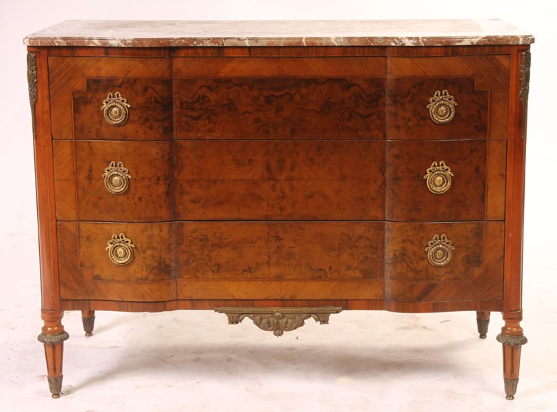 MARBLE TOP BRONZE MOUNTED BURL WOOD COMMODE: A marble top and bronze mounted burl wood blockfront commode having three drawers circa 1930. Ht: 33.5" Width: 44.25" Depth: 20.5"