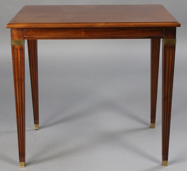 JANSEN STYLE RECTANGULAR OCCASIONAL TABLE: A Jansen style rectangular occasional table having fluted column legs with bronze capitals and bronze feet. Ht: 25" Width: 27.5" Depth: 19.5"