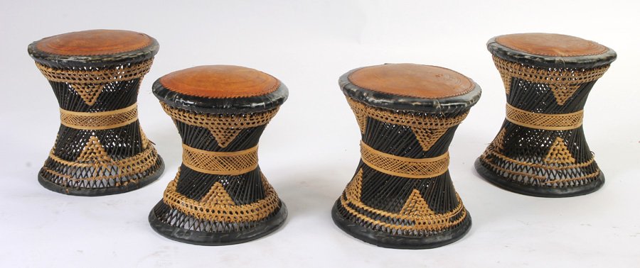4 LEATHER WICKER STOOLS: Four leather and wicker stools circa 1970. Ht: 16" Width: 14.5" Depth: 14.5"
