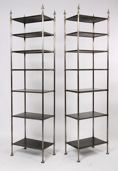 PAIR TALL WOOD POLISHED ETEGERES 7 SHELVES: A pair of tall wood and polished etegeres having seven shelves and arrow form finials. Ht: 97" Width: 26" Depth: 16"