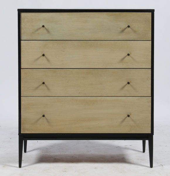 LABELED PAUL MCCOBB TALL CHEST OF DRAWERS: A labeled Paul McCobb Planner Group tall chest of drawers having an ebonized case and painted drawer fronts raised on tapered legs. Ht: 56" Width: 43" Depth: 18.5"