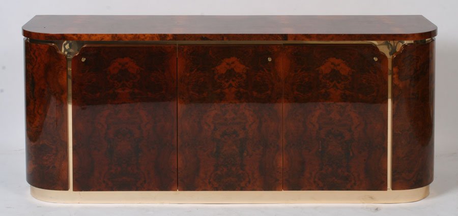 BRASS BURL WOOD SIDEBOARD 3 LARGE DOORS: A brass and burl wood sideboard having three large doors circa 1970. Ht: 32.5" Width: 81" Depth: 21.5"