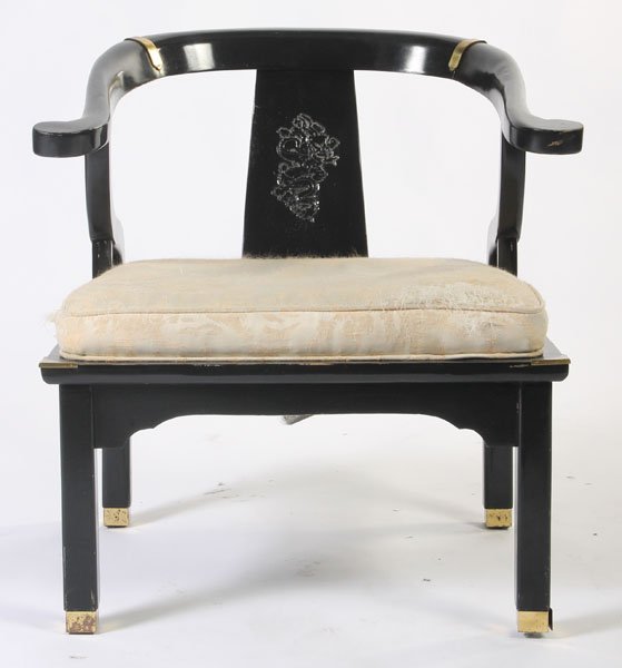ASIAN INSPIRED MODERN EBONIZED ARM CHAIR: An Asian inspired modern ebonized arm chair with yoke back and dragon carved central splat over upholstered cushion circa 1970. Ht: 30" Width: 28" Depth: 20"
