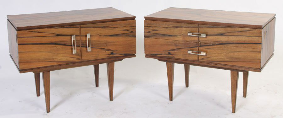 PAIR MODERN SIDE CABINETS 2 DRAWERS 2 DOORS: A pair of mid century modern side cabinets, one having two drawers, the other with two doors. Both raised on tapered legs circa 1960. Ht: 17.5" Width: 23" Depth: 13"