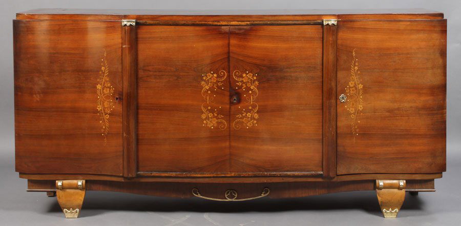 FRENCH ART DECO JULES LELEU STYLE SIDEBOARD: A very good French Art Deco Jules Leleu style rosewood sideboard having a serpentine front with two central doors circa 1930. Central doors with satinwood inlay and flanked by two curved doors. The wh