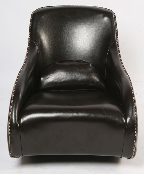 PAIR OF MODERN LEATHER STICHED ROCKING CHAIRS: A pair of modern leather stitched rocking chairs of downswept form. Ht: 32" Width: 30" Depth: 39"